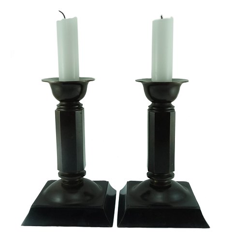 Just Andersen; 
candlesticks in patinated bronze