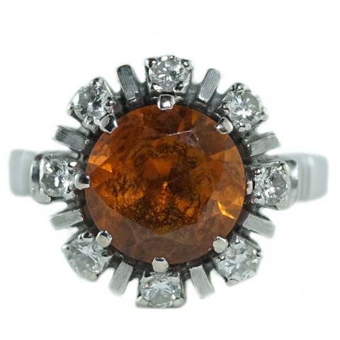 Jørgen Larsen; Ring of 18k white gold set with a fire opal and diamonds