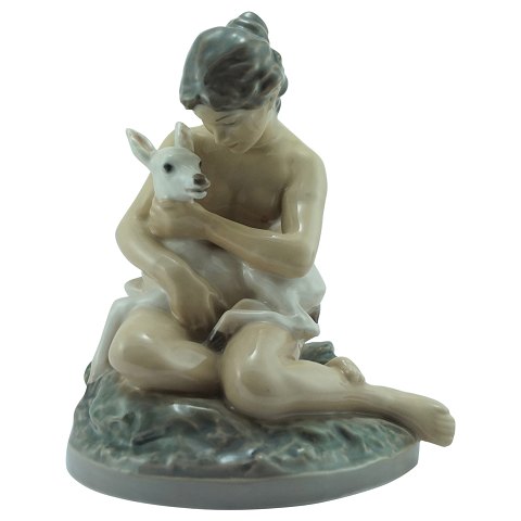 Dahl Jensen; a porcelain figurine, Woman with a goat #1276