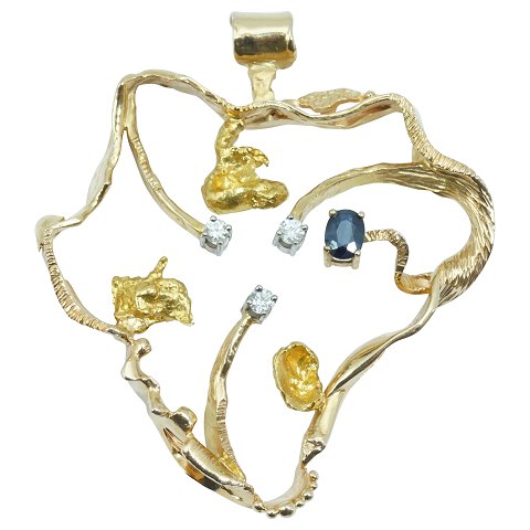 John Rørvig; A pendant of 18k gold with a sapphire and diamonds