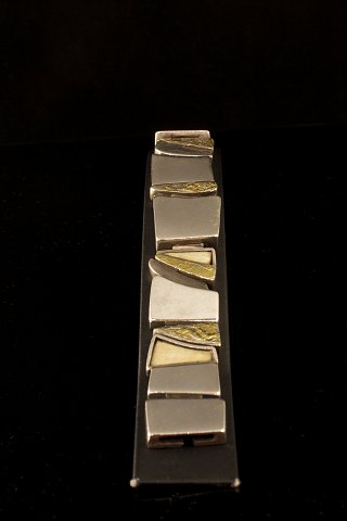 Silver bracelet with semi-gilded surfaces and inlaid with bone