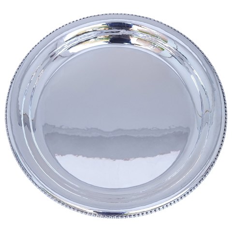 Georg Jensen; A plate of sterling silver #290C