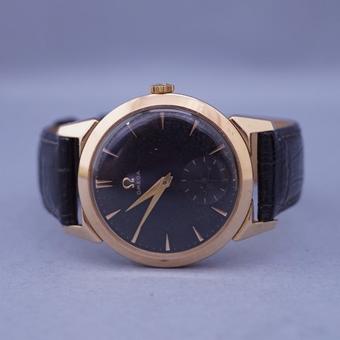 Omega; armbåndsur i guld double fra 1954