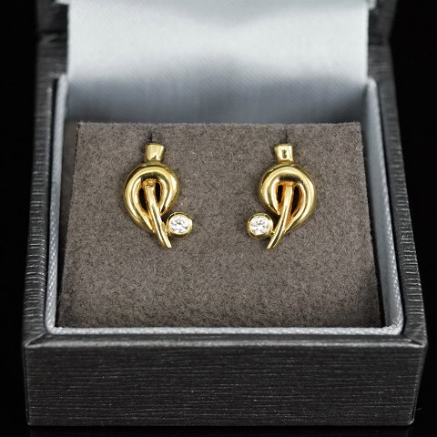 Ørestikker/øreringe af 8 kt. guld med zirkoner