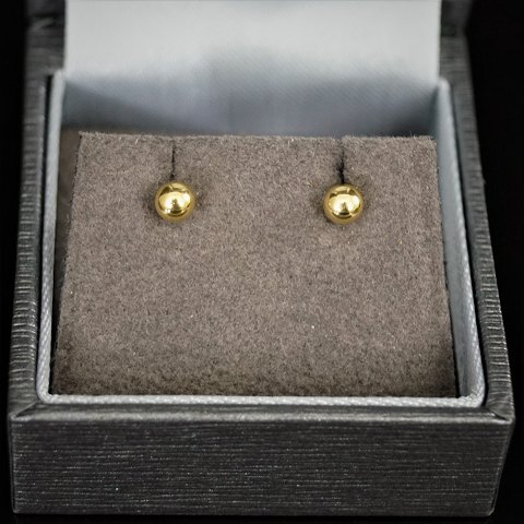 Øreringe/ørestikker af 14 kt. guld, kugler diam. 4 mm.