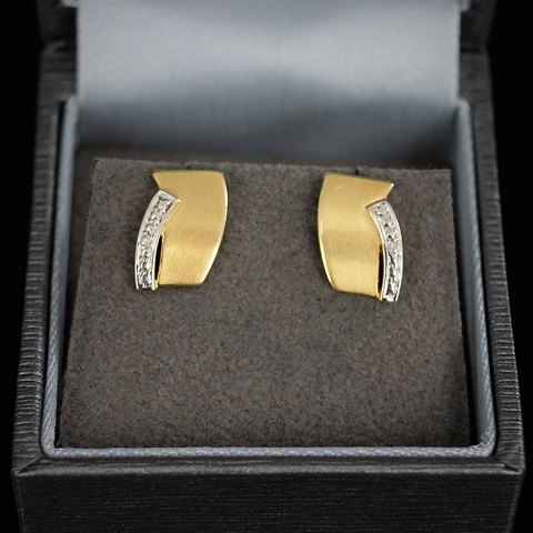 Ørestikker/øreringe af 14 kt. guld og hvidguld med diamanter