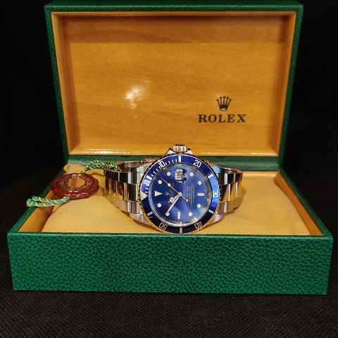 Rolex; Armbåndsur, Submariner, Oyster Perpetual Date, ref.nr. 16613