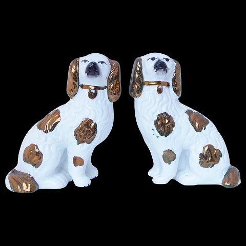 A pair of English staffordshire dogs, faience around 1850