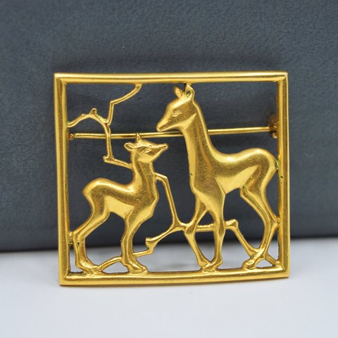 A. Dragsted; A Brooch of 14k gold, with motif of two deers