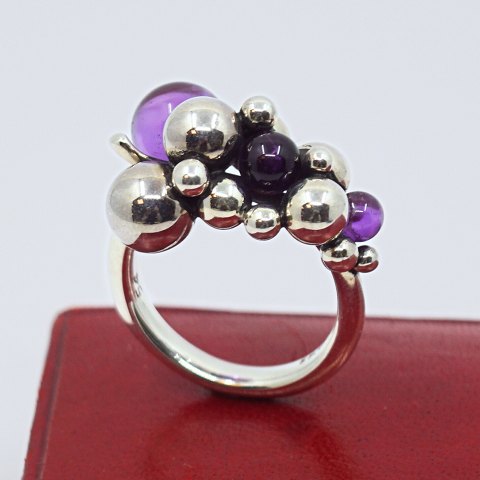 Georg Jensen; A Moonlight Grapes ring of sterling silver set with amethysts