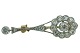 A diamond brooch mounted in 14k gold and white gold