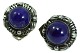 Georg Jensen; Clip-on earrings of sterling silver with lapis lazuli