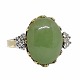 Hugo Grün; Ring in 14k gold and white gold set with jade and diamonds