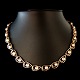 Viggo Wollny; A necklace in 14k gold set with pearls