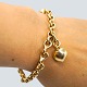 Ole Lynggaard; Bracelet of 14k gold, with heart charm and 