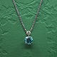 Necklace of 14k white gold set with a turquoise zircon and diamond
