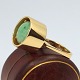 Flemming Lund; A 14k gold ring set with jade